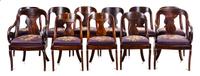A Set of Eleven American Empire Mahogany Dining Chairs Height of armchair 34 3/4 inches. — MID-19TH CENTURY