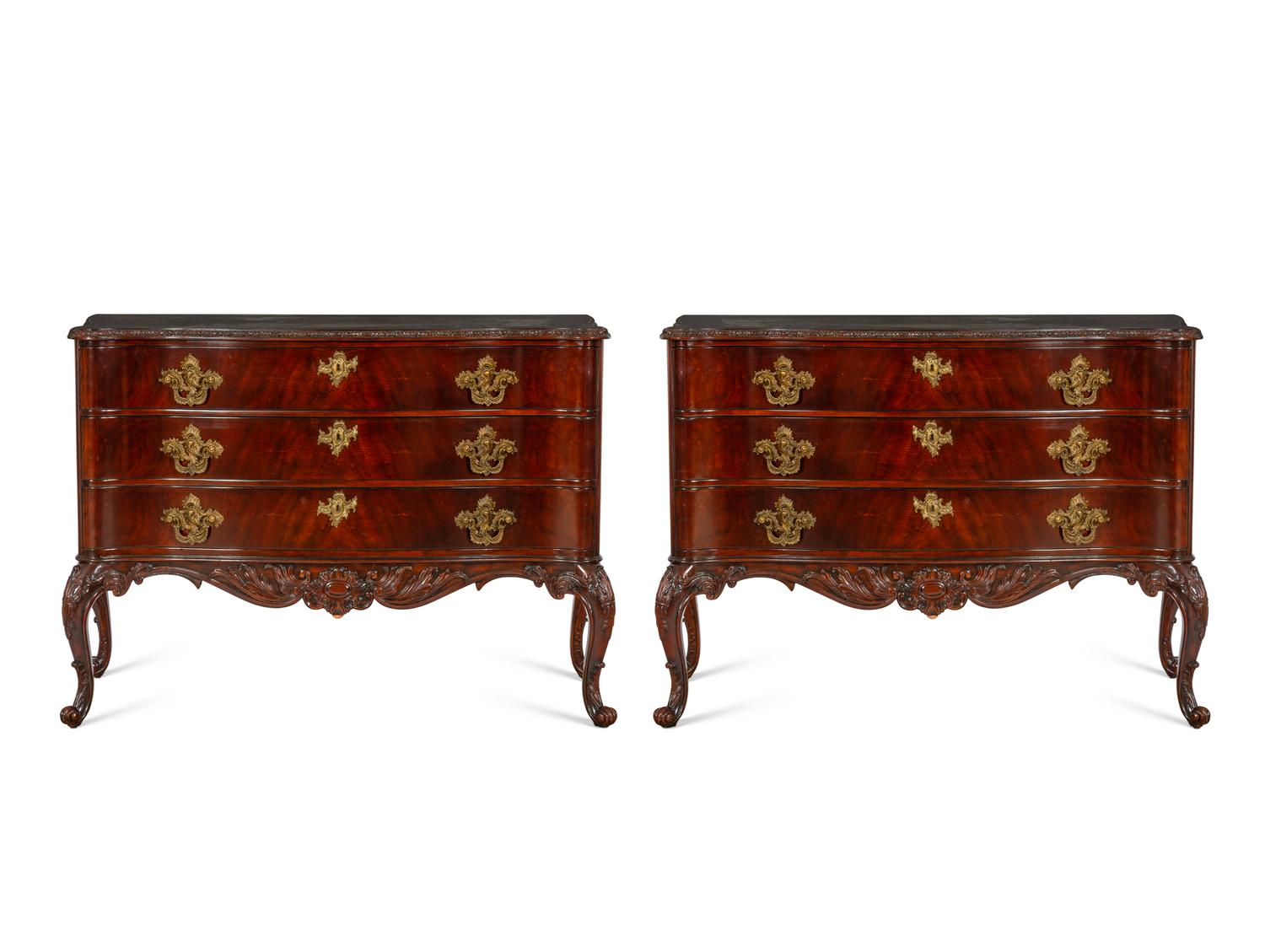 A Pair of Ralph Lauren Heiress Carved Mahogany Commodes