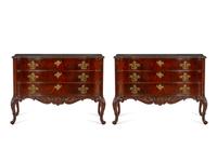 A Pair of Ralph Lauren Heiress Carved Mahogany Commodes