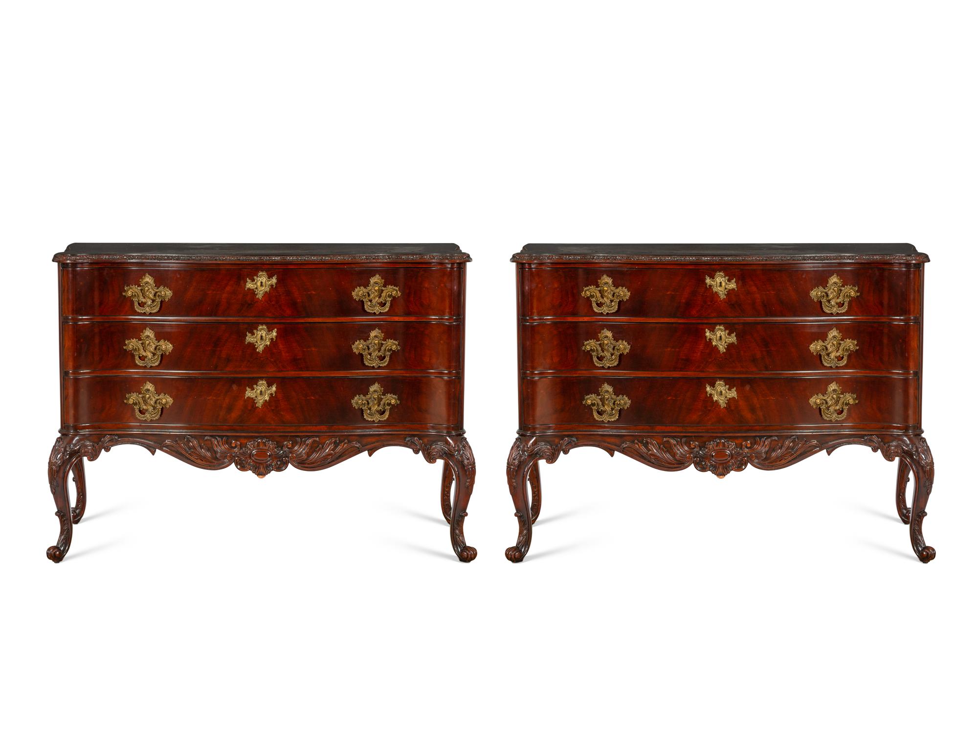 A Pair of Ralph Lauren Heiress Carved Mahogany Commodes