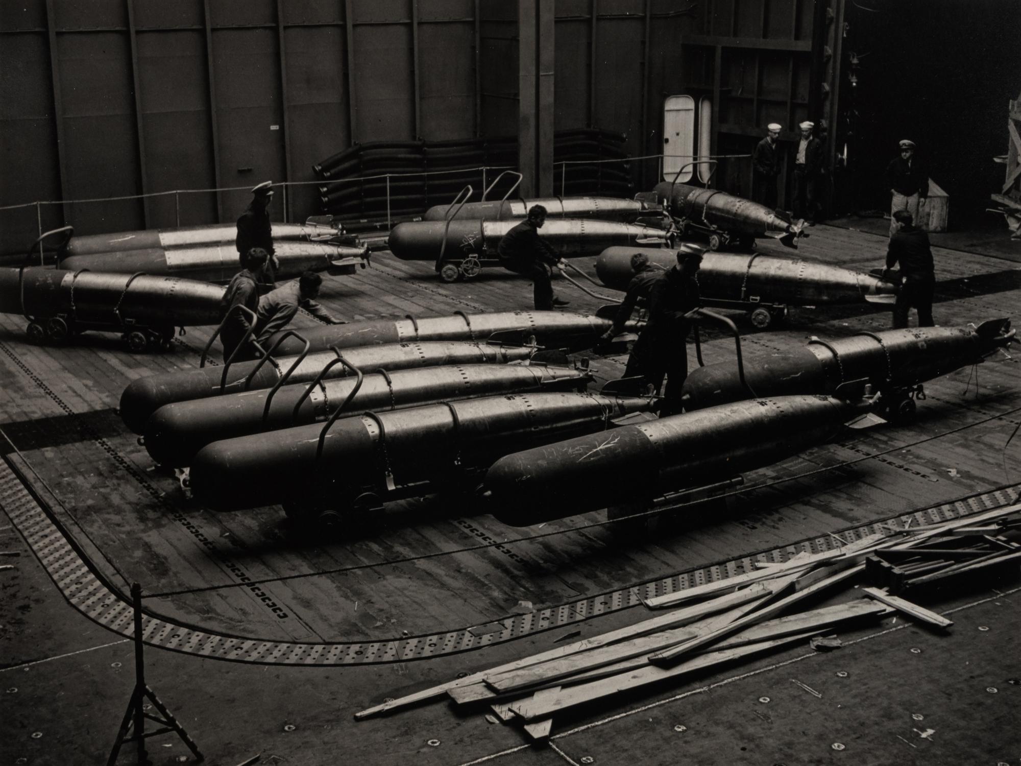 IANNELLI, Fons (1919-1988). Crew with Naval Torpedoes, U.S.S. Yorktown . c. 1943.