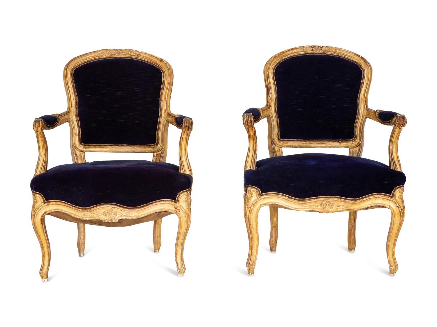 A Pair of Louis XV Giltwood Fauteuils