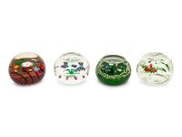 A Group of Seven Millefiori Glass Paperweights