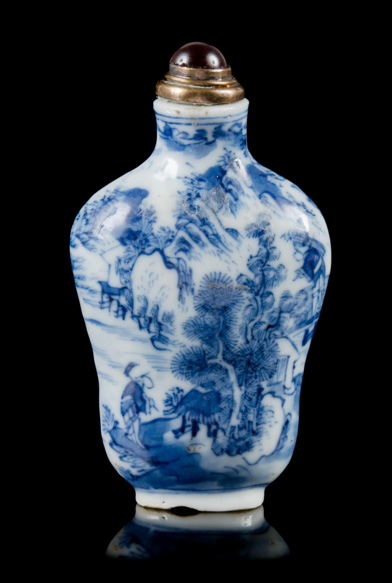 A Blue ane White Porcelain Snuff Bottle Height 2 1/2 inches. — GUANGXU PERIOD (1875-1908)