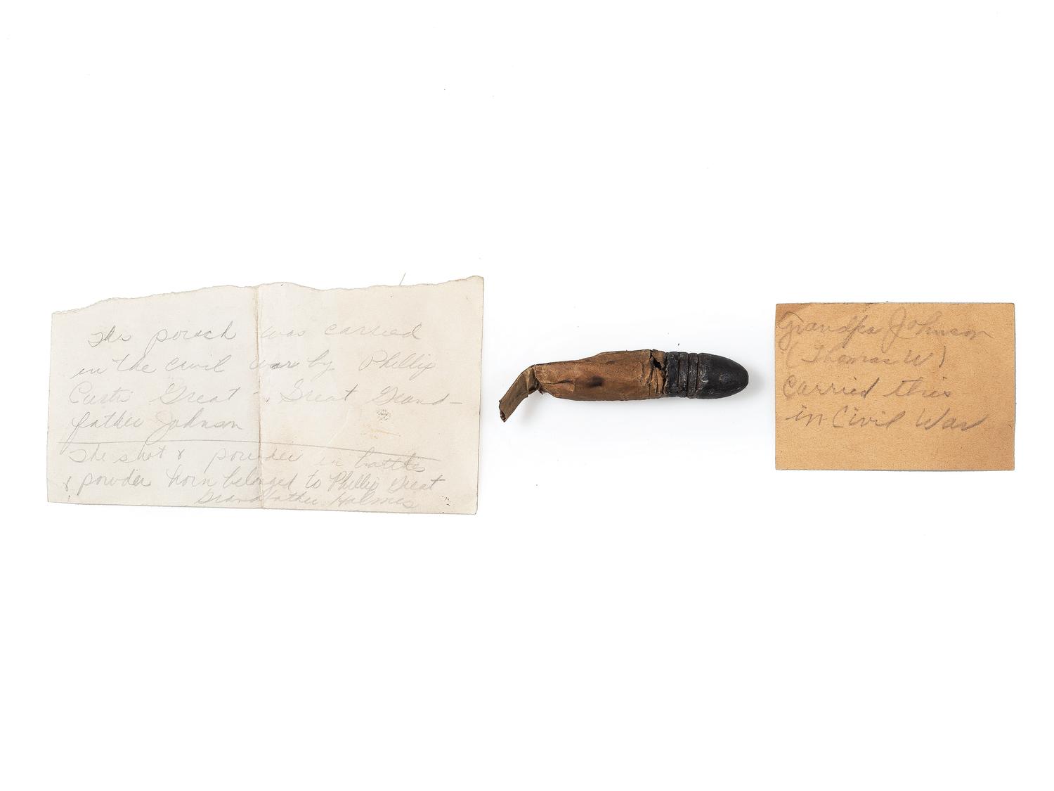 [CIVIL WAR]. A collection of items attributed to Thomas W. Johnson, Co. K, 4th Delaware Infantry, incl. frock coat, cap, belt rig, and cartridge box.