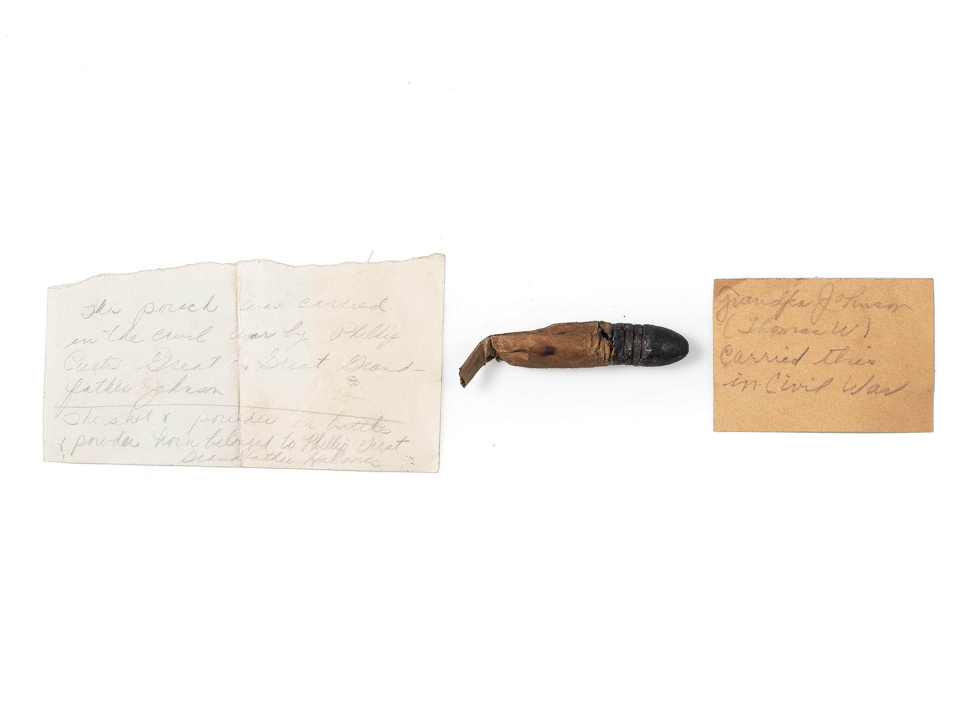 [CIVIL WAR]. A collection of items attributed to Thomas W. Johnson, Co. K, 4th Delaware Infantry, incl. frock coat, cap, belt rig, and cartridge box.