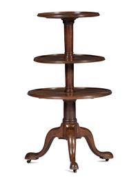 A George III Carved, Turned and Dished Walnut Three-Tier Dumbwaiter
