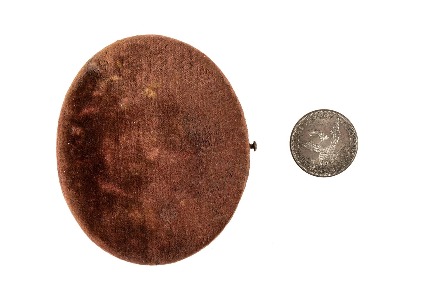 [EARLY PHOTOGRAPHY]. A group of daguerreotype portraits, incl. pendant, possible Hawaiian subject, and case featuring portrait of Daguerre.