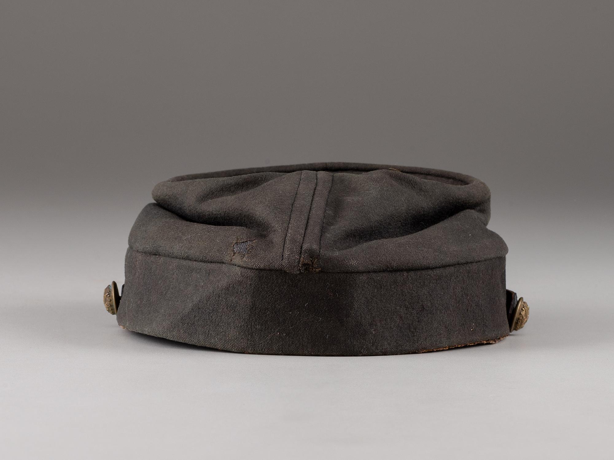 [CIVIL WAR]. Kepi and sash identified to Surgeon Hermann Ideler, 45th New York Infantry and 15th New York Heavy Artillery.