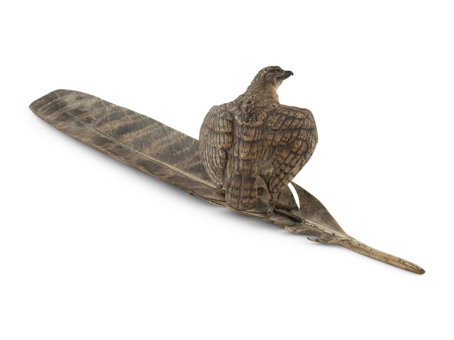 An Austrian Cold-Painted Bronze Figure of a Bird of Prey Perched on a Feather