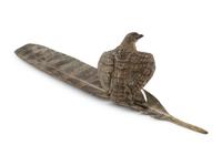 An Austrian Cold-Painted Bronze Figure of a Bird of Prey Perched on a Feather