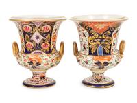 A Near Pair of Derby Porcelain Campagna Urns