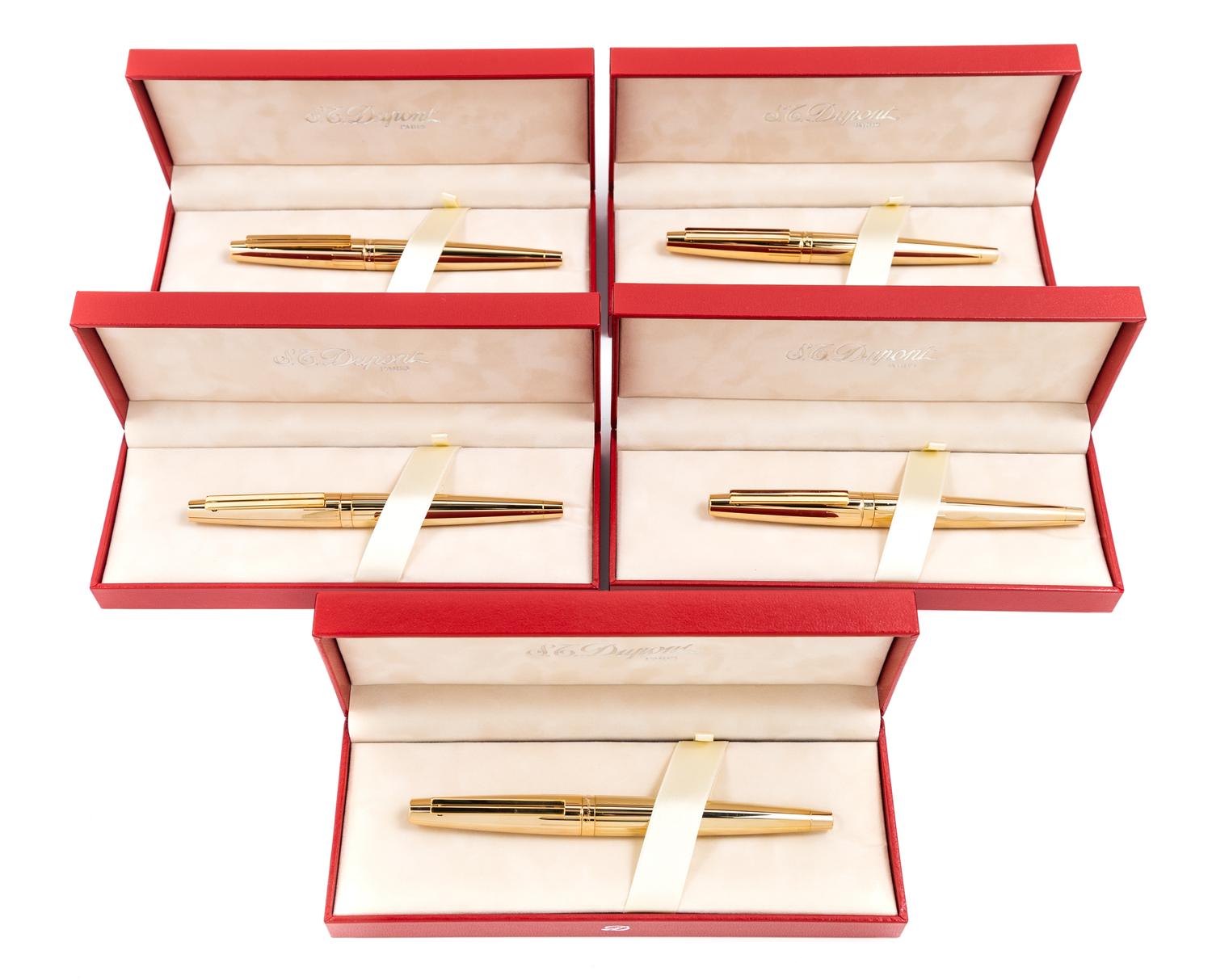 A Group of Five S.T. Dupont Gold-Plated Ellipsis Fountain Pens