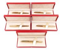 A Group of Five S.T. Dupont Gold-Plated Ellipsis Fountain Pens