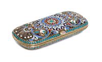 A Russian Enameled Silver Cigarette Case, 19th/20th Century, of rectangular form centered with a polychrome medallion.