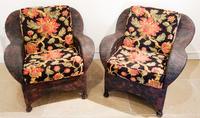 A Pair of Black and Red Painted Wicker Armchairs Height 34 inches. — 20TH CENTURY