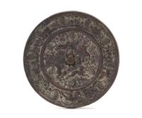 A Bronze 'Grapevine and Beast' Circular Mirror Diameter 3 7/8 inches.