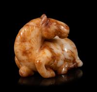 A Yellow Jade Figure of Recumbent Horse