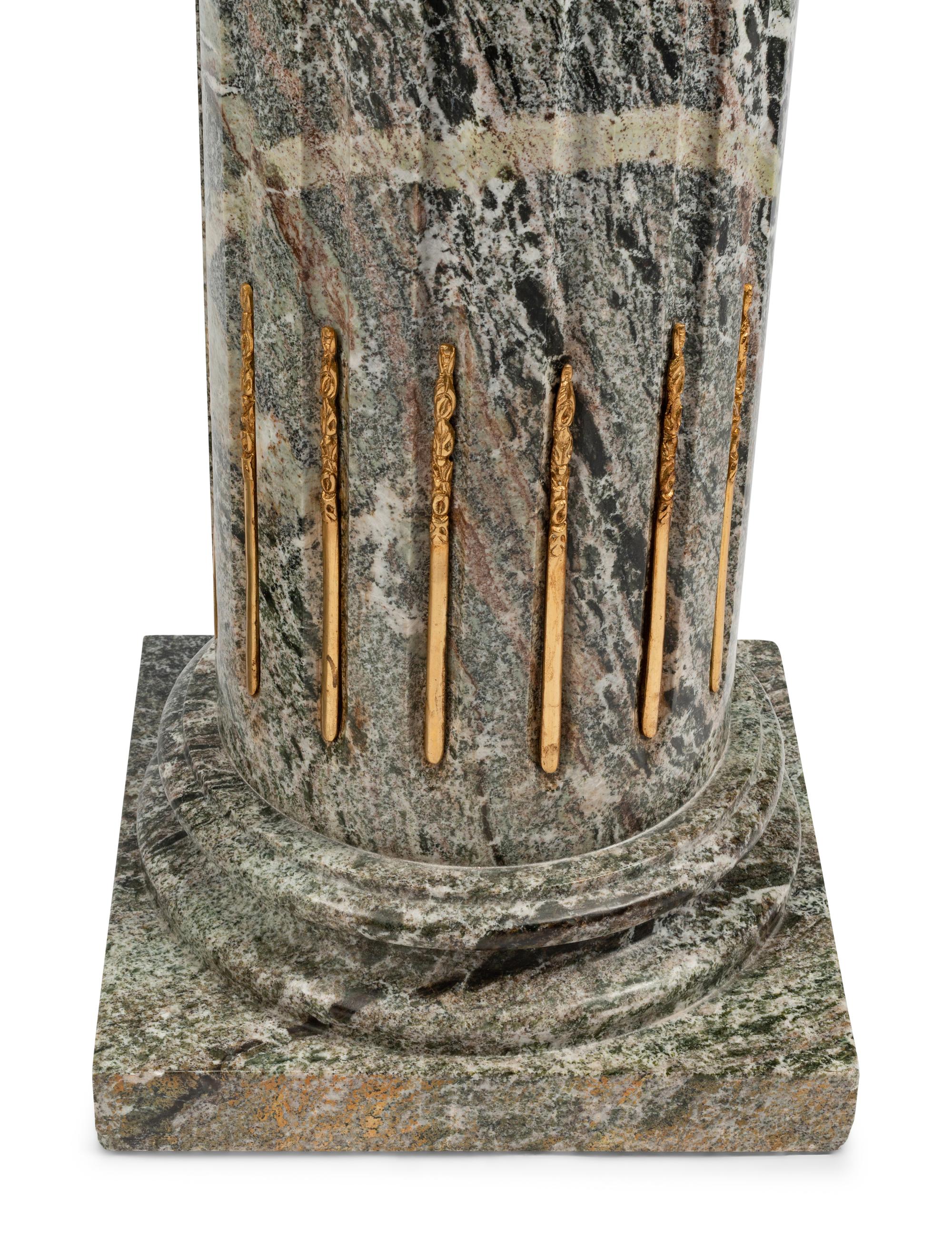 A Pair of Continental Gilt Bronze Mounted Marble Pedestals