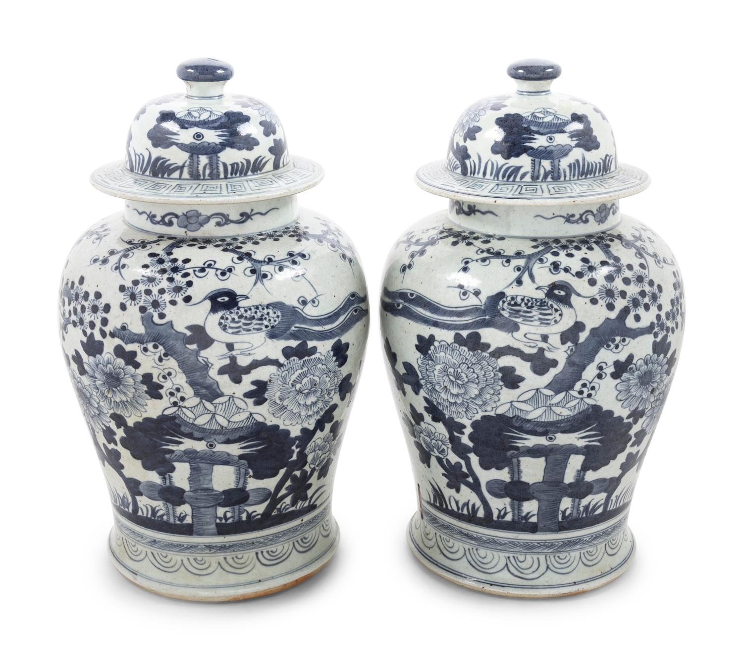 Two Pairs of Chinese Blue and White Porcelain Jars and Covers