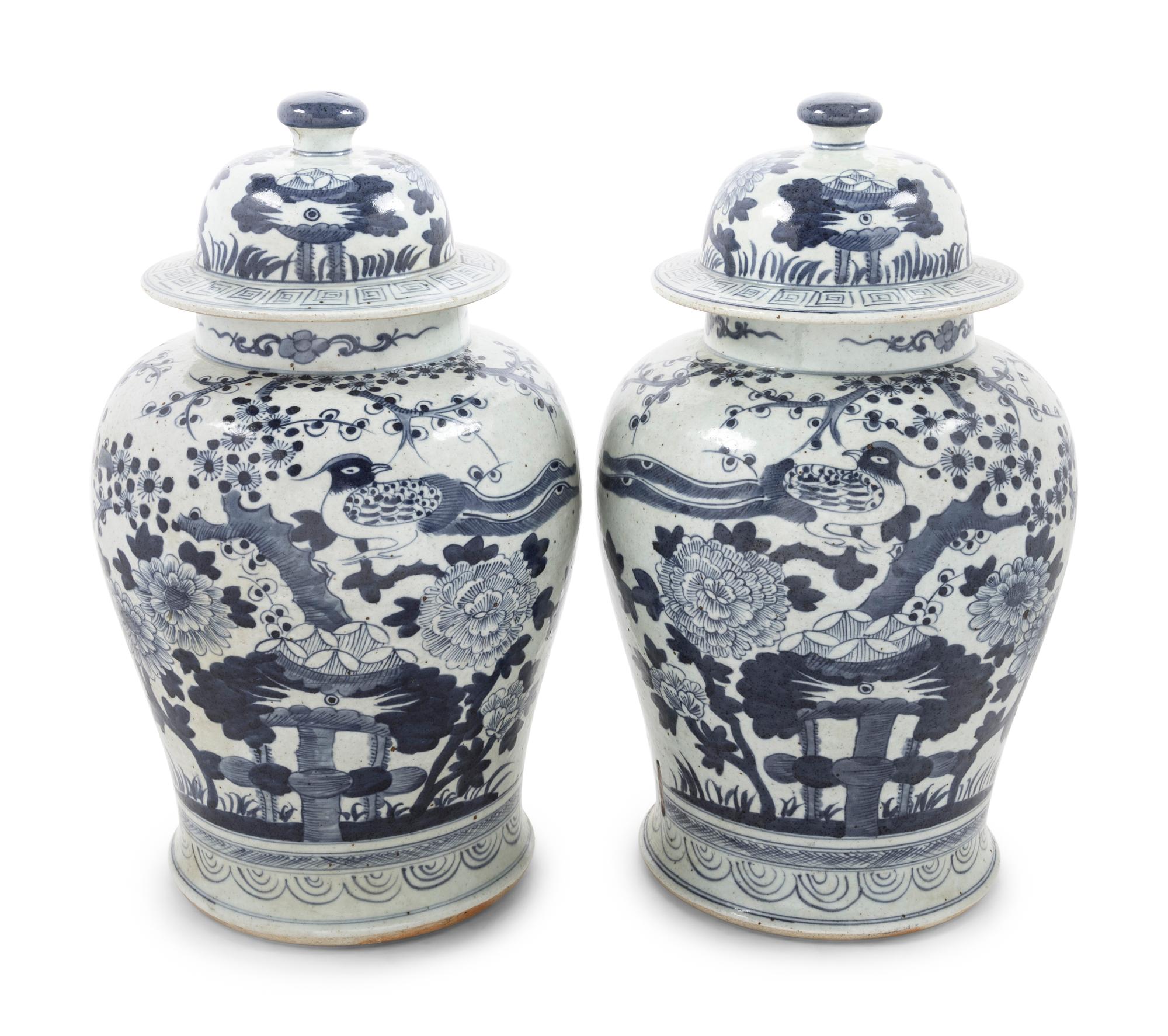 Two Pairs of Chinese Blue and White Porcelain Jars and Covers