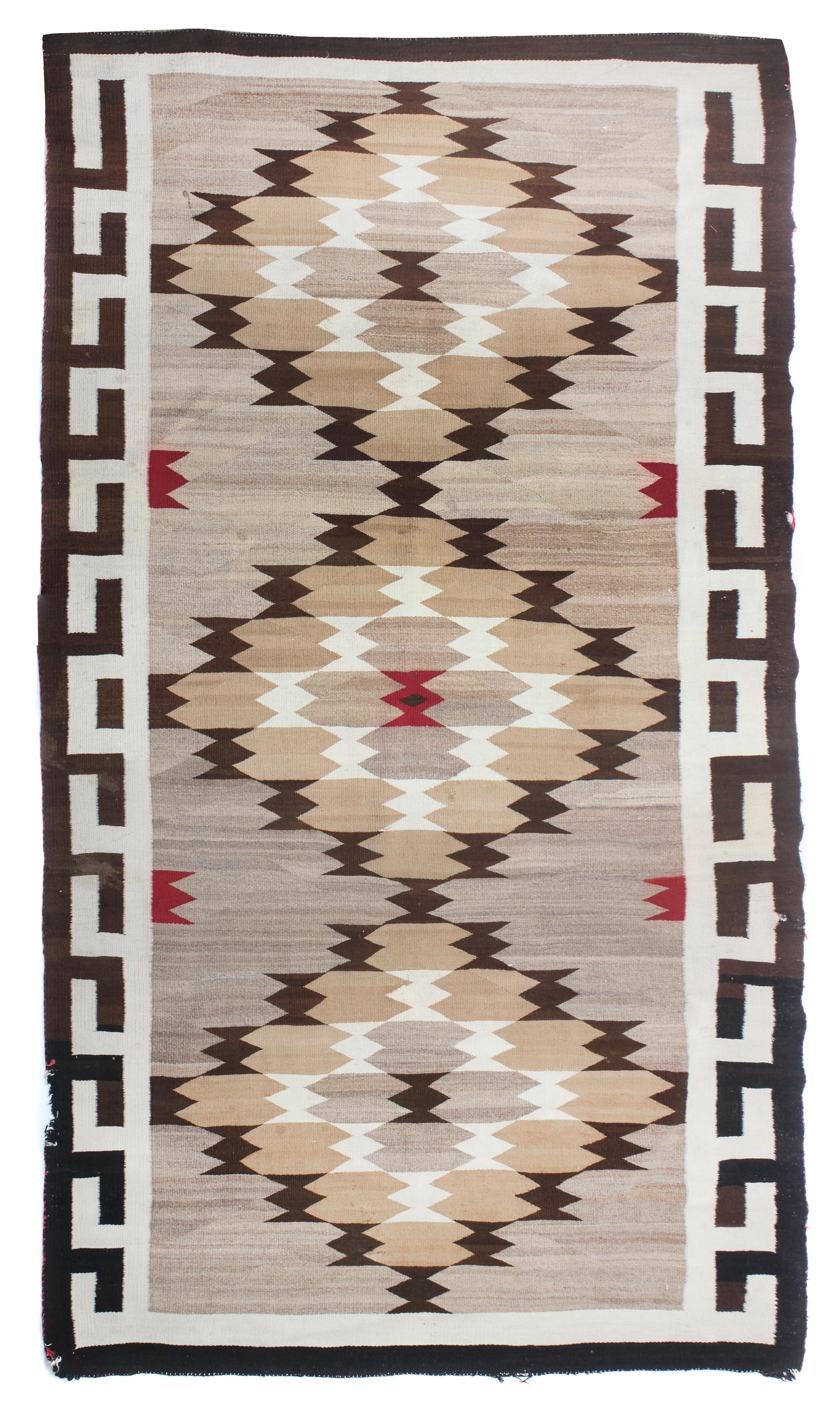 A Navajo Crystal Rug 58 x 108 inches.