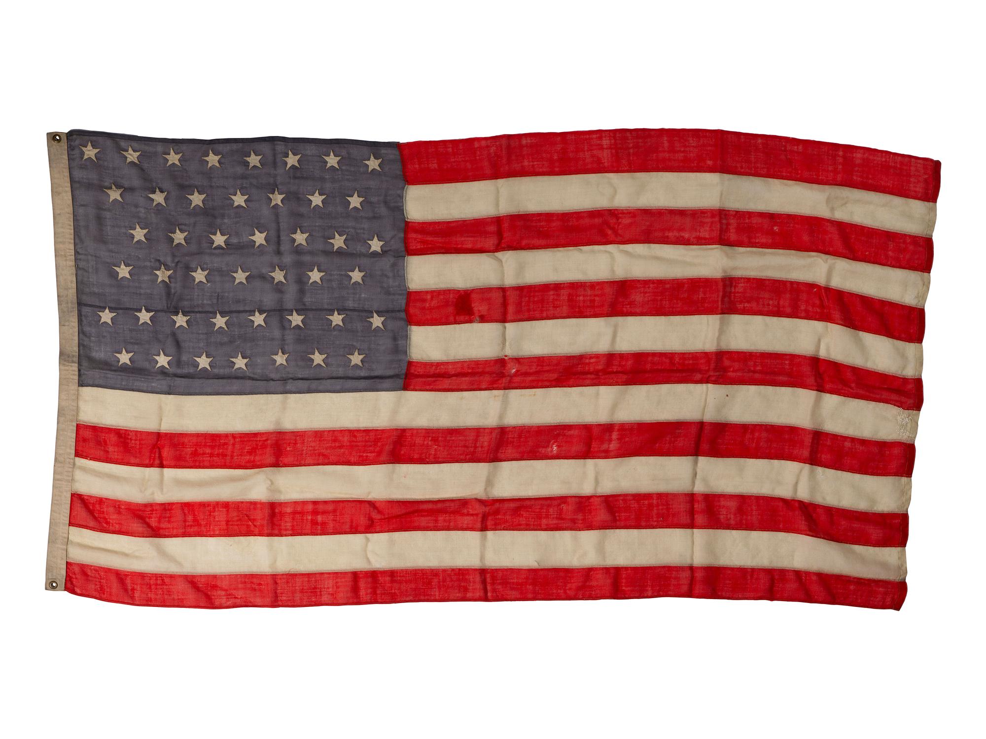 [CIVIL WAR]. A group of 2 American flags, incl. 44-star flag identified to “Camp 6 SoV ILL DIV USA” (Sons of Veterans, Illinois Division USA). [Ca 1891-1896].