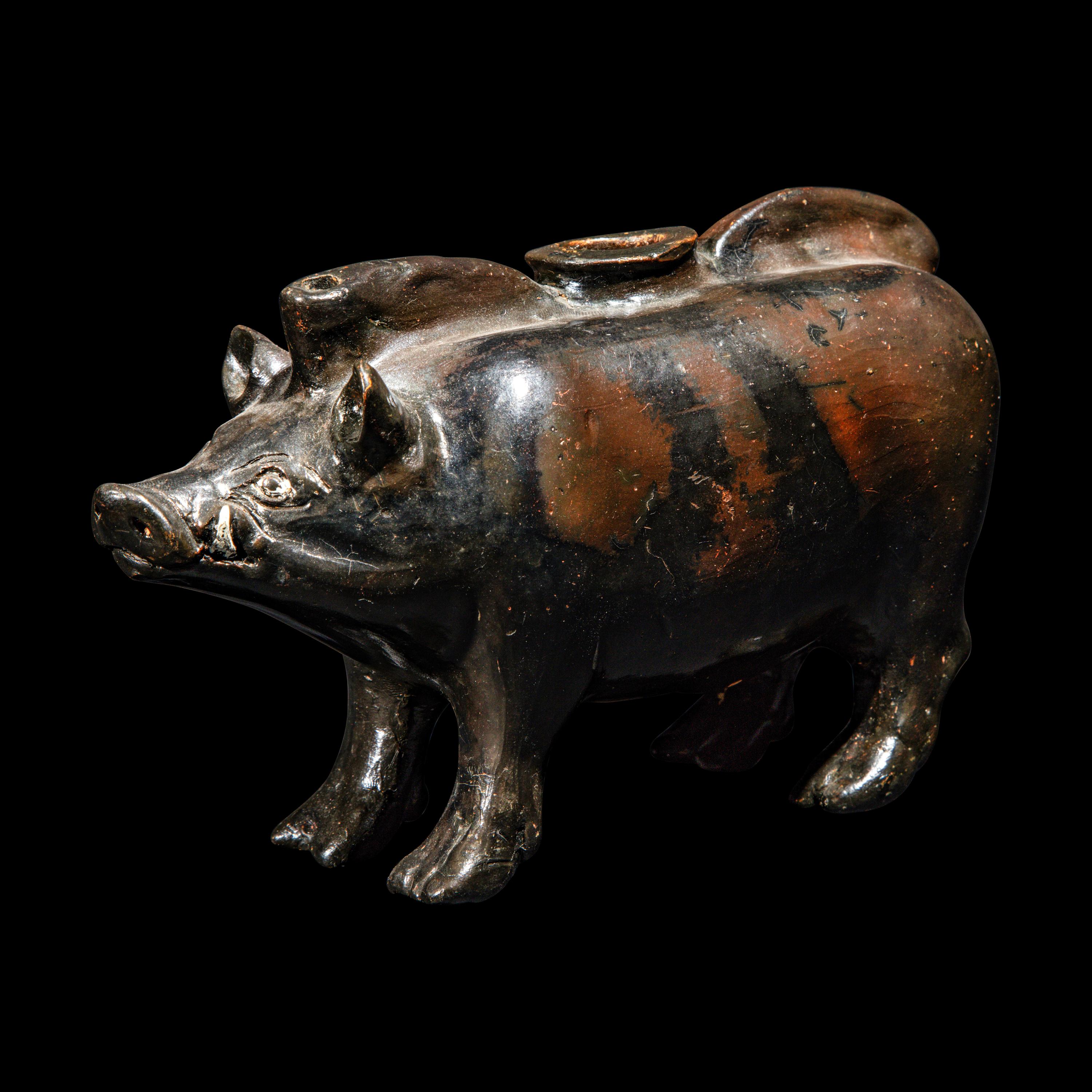 A South Italian Black-Glazed Askos in the form of a Boar