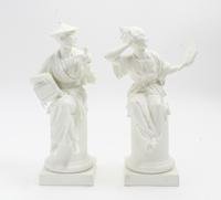 A Pair of Royal Worcester Bisque Porcelain Figures Height 11 1/2 inches. — MID 20TH CENTURY