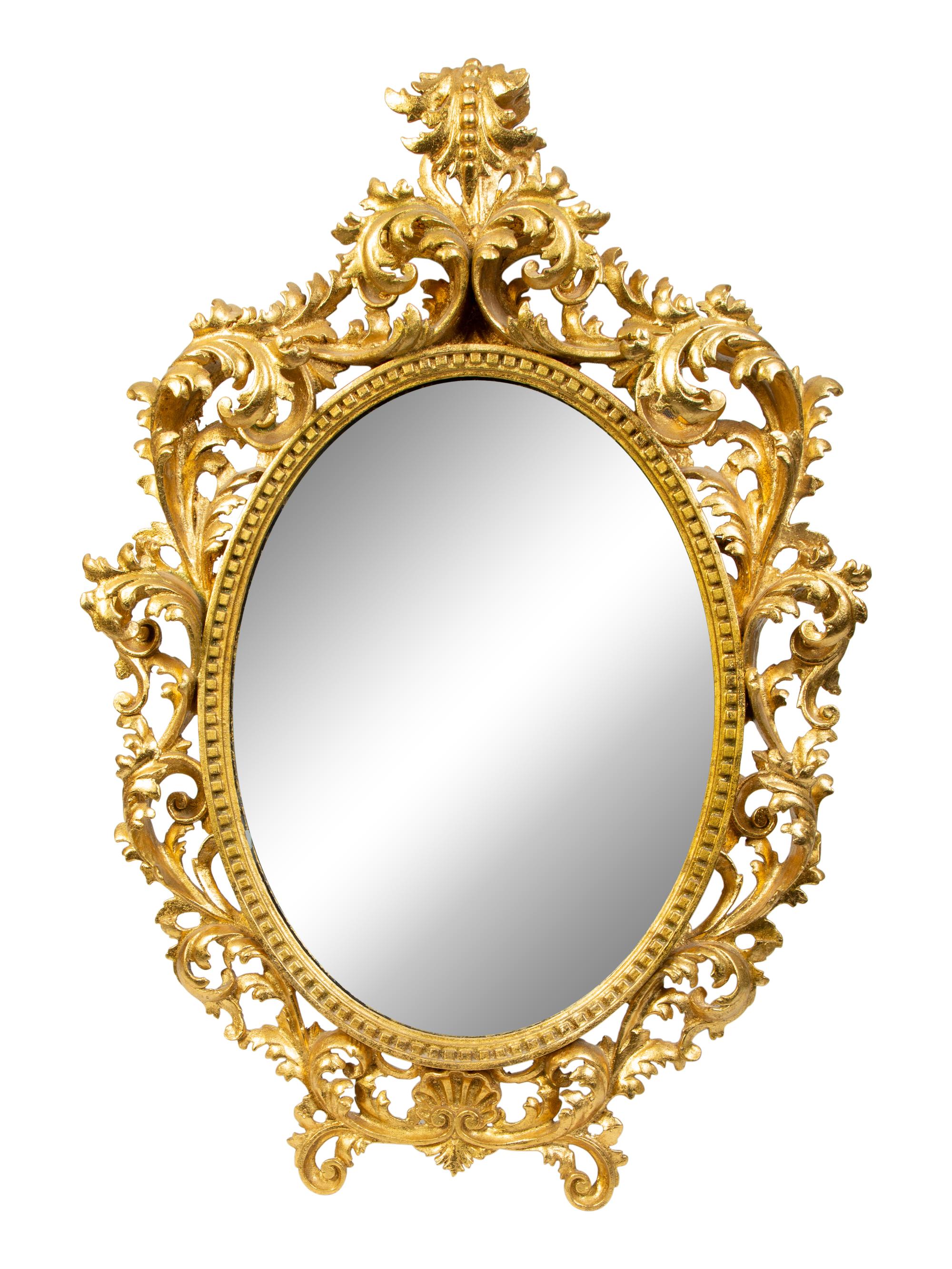 An Italian Rococo Style Carved Giltwood Oval Mirror and a Pair of Wall Brackets — 19TH/20TH CENTURY