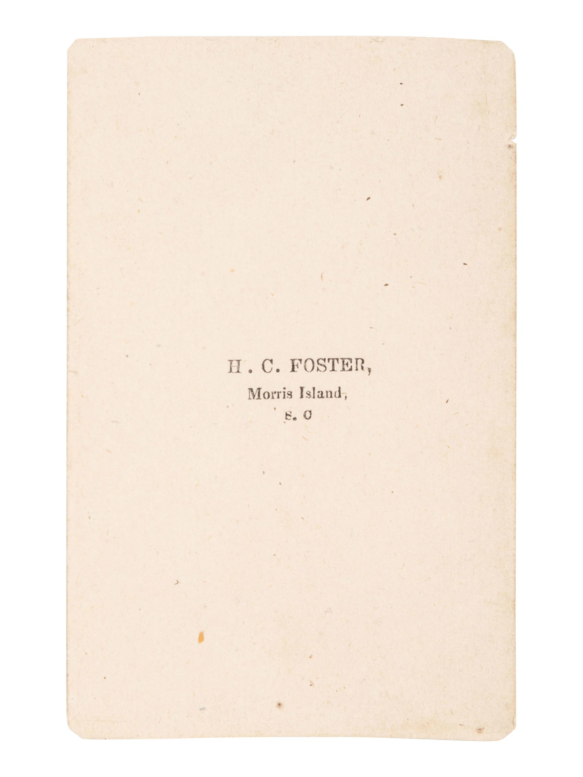 [CIVIL WAR]. CDV album containing images of 2 soldiers, incl. Corodon Mason, USCT, 32nd Infantry.