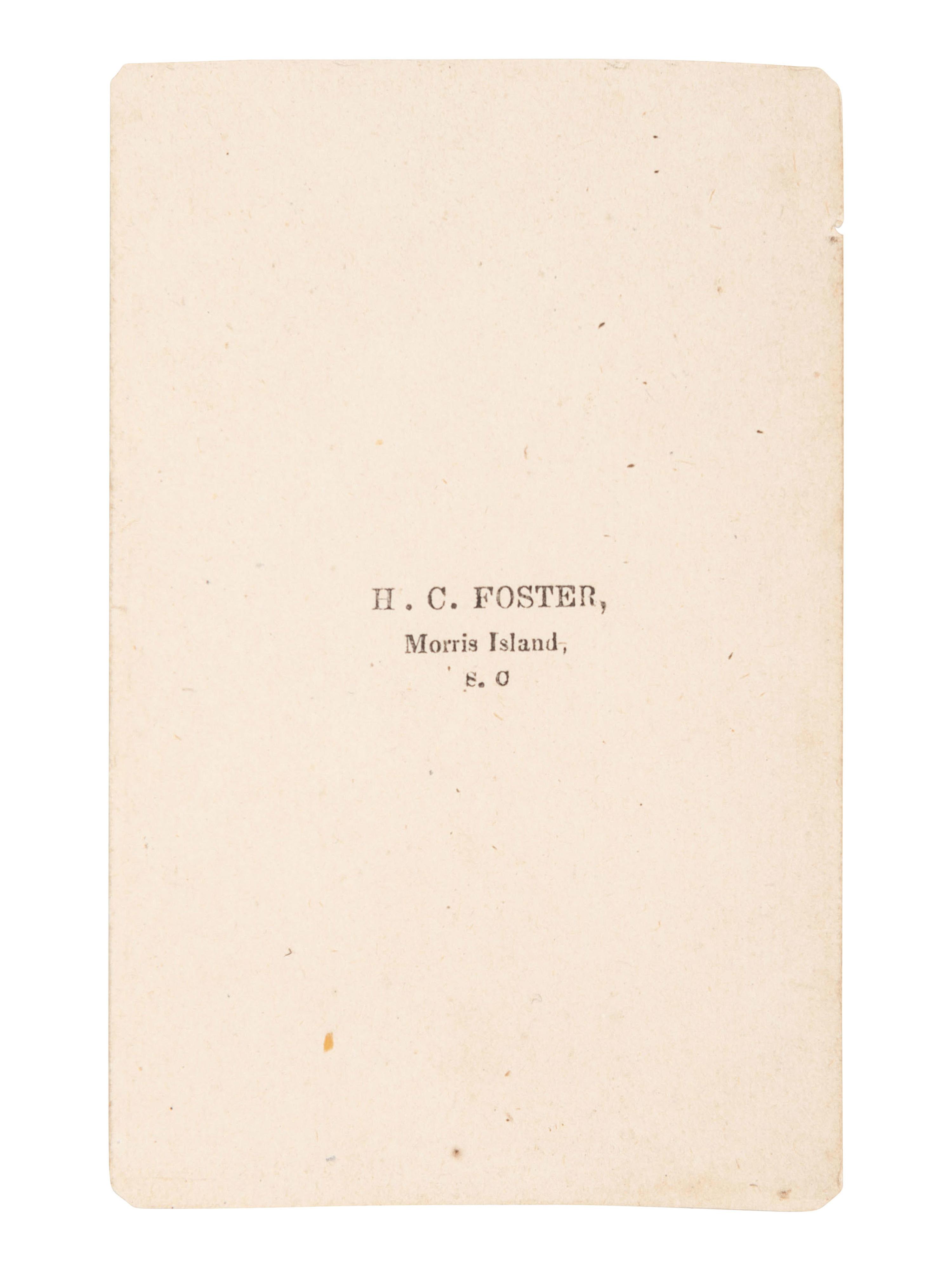 [CIVIL WAR]. CDV album containing images of 2 soldiers, incl. Corodon Mason, USCT, 32nd Infantry.