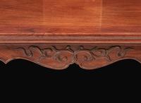 A pair of Chinese huanghuali continuous yoke-back armchairs, Nanguanmaoyi, Qing Dynasty 黃花梨南官帽椅一對 清