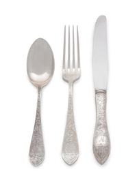 Tudor Scroll pattern, comprising: 12 dinner knives with stainless steel blades 12 dinner forks 8 luncheon forks 16 salad forks 12 butter spreaders with stainless steel blades 8 tablespoons 3 gumbo spoons 12 soup spoons 8 teaspoons 12 five o'clock spoons 11 demitasse spoons 1 berry spoon with stainless steel 1 cake knife with stainless steel blade 2 cheese servers with stainless steel blades 1 serving fork with stainless steel blade 8 serving utensils 127 items total.
