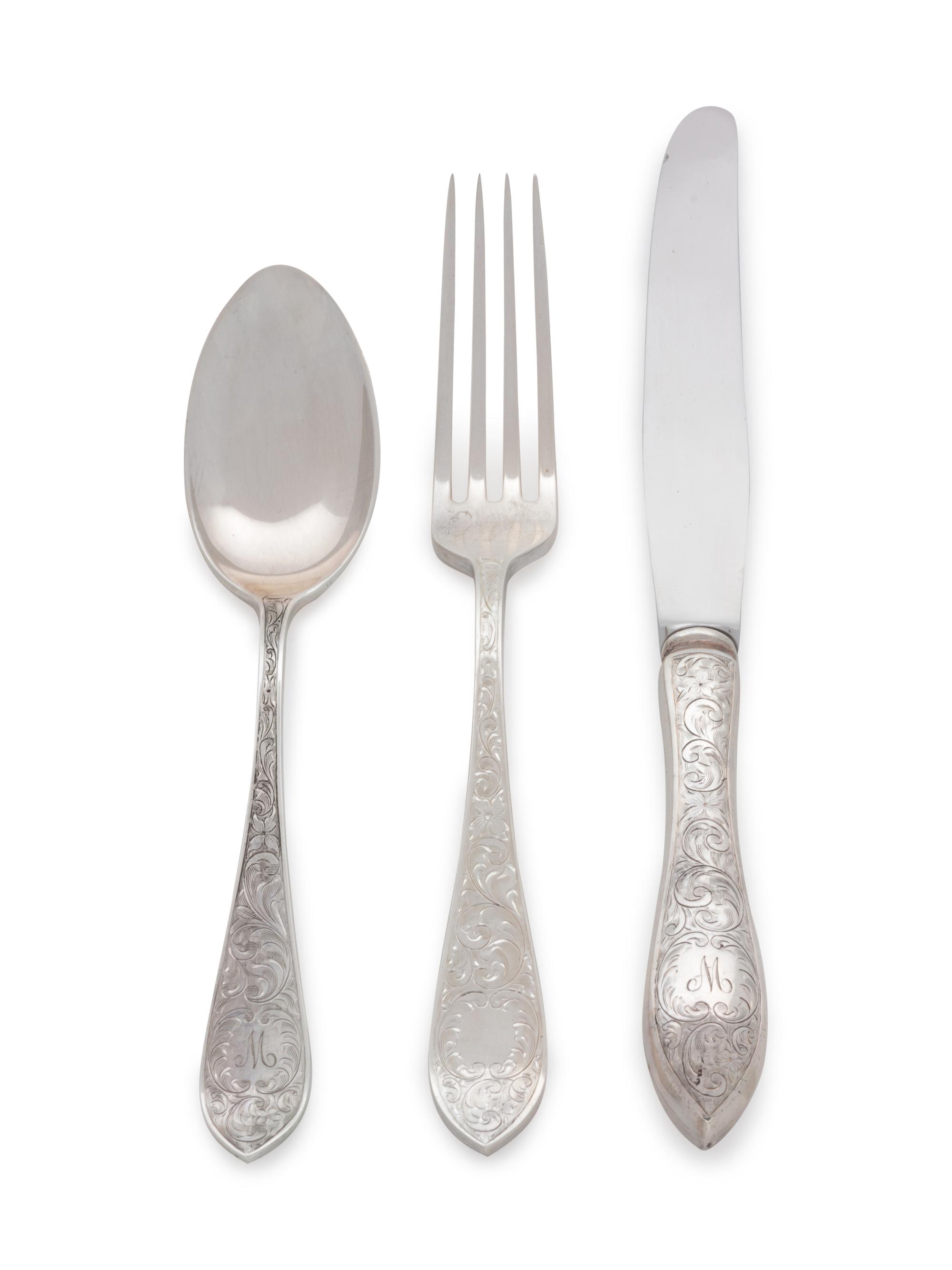 Tudor Scroll pattern, comprising: 12 dinner knives with stainless steel blades 12 dinner forks 8 luncheon forks 16 salad forks 12 butter spreaders with stainless steel blades 8 tablespoons 3 gumbo spoons 12 soup spoons 8 teaspoons 12 five o'clock spoons 11 demitasse spoons 1 berry spoon with stainless steel 1 cake knife with stainless steel blade 2 cheese servers with stainless steel blades 1 serving fork with stainless steel blade 8 serving utensils 127 items total.