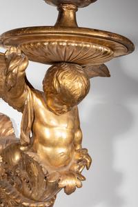 A Pair of Italian Giltwood Figural Wall Brackets