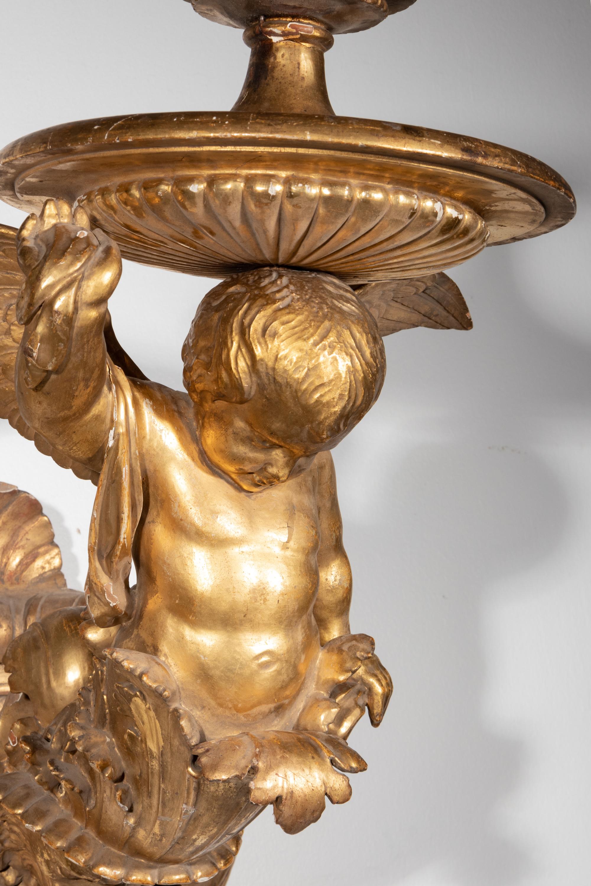 A Pair of Italian Giltwood Figural Wall Brackets