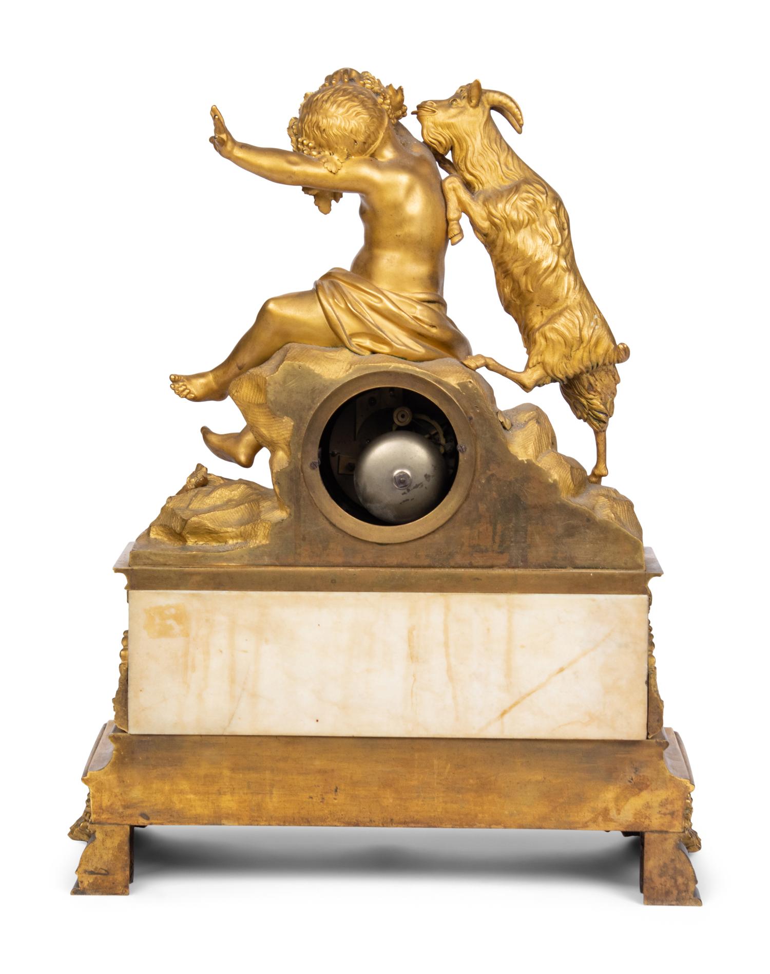 A Louis Philippe Gilt Bronze and White Marble Mantel Clock