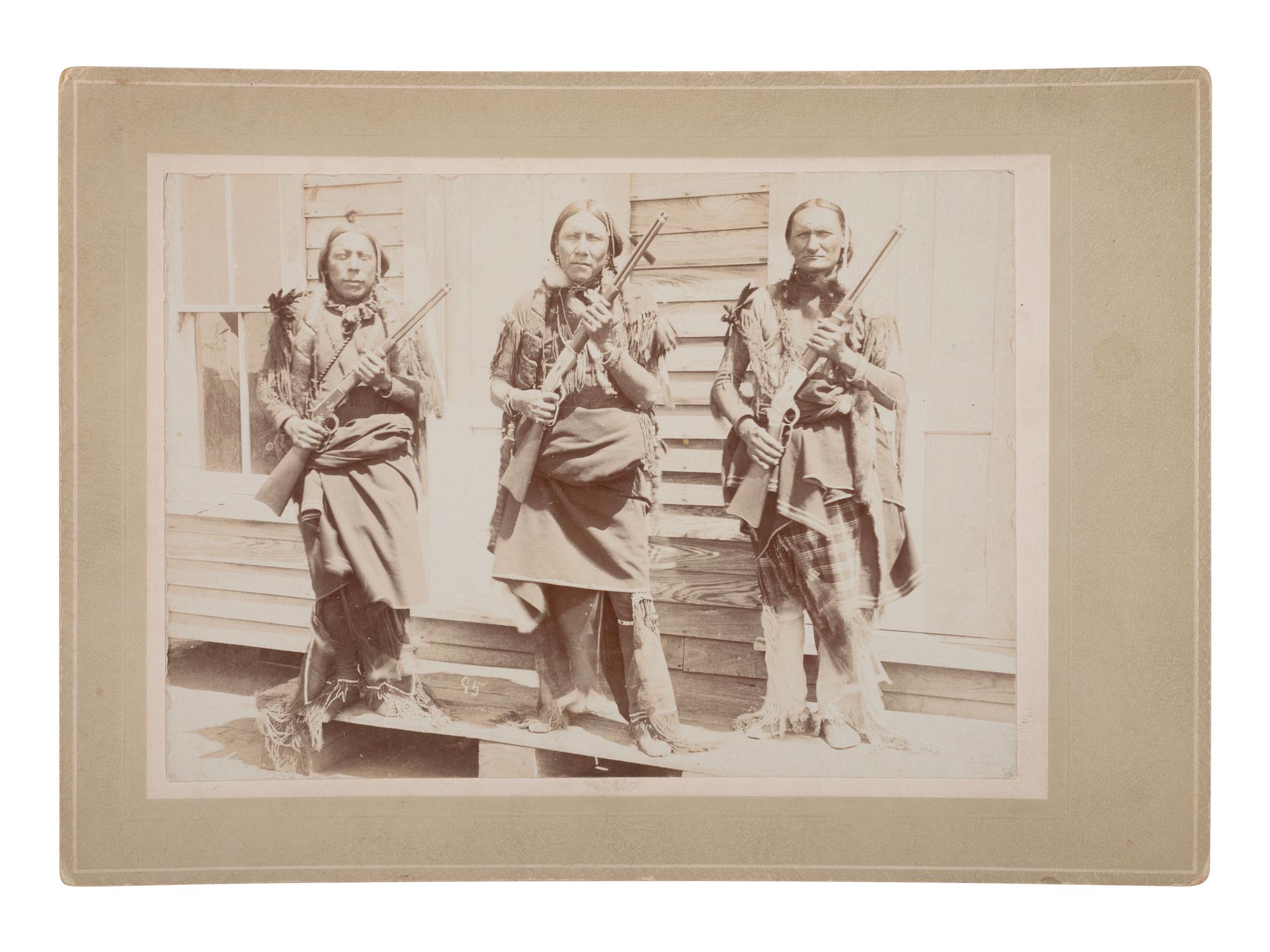 [NATIVE AMERICANS]. Cabinet card of Kiowa-Comanche Reservation leaders Silverhorn, Anko, and Comanche Jack. [Oklahoma, I.T.]: [Irwin], ca 1890s.