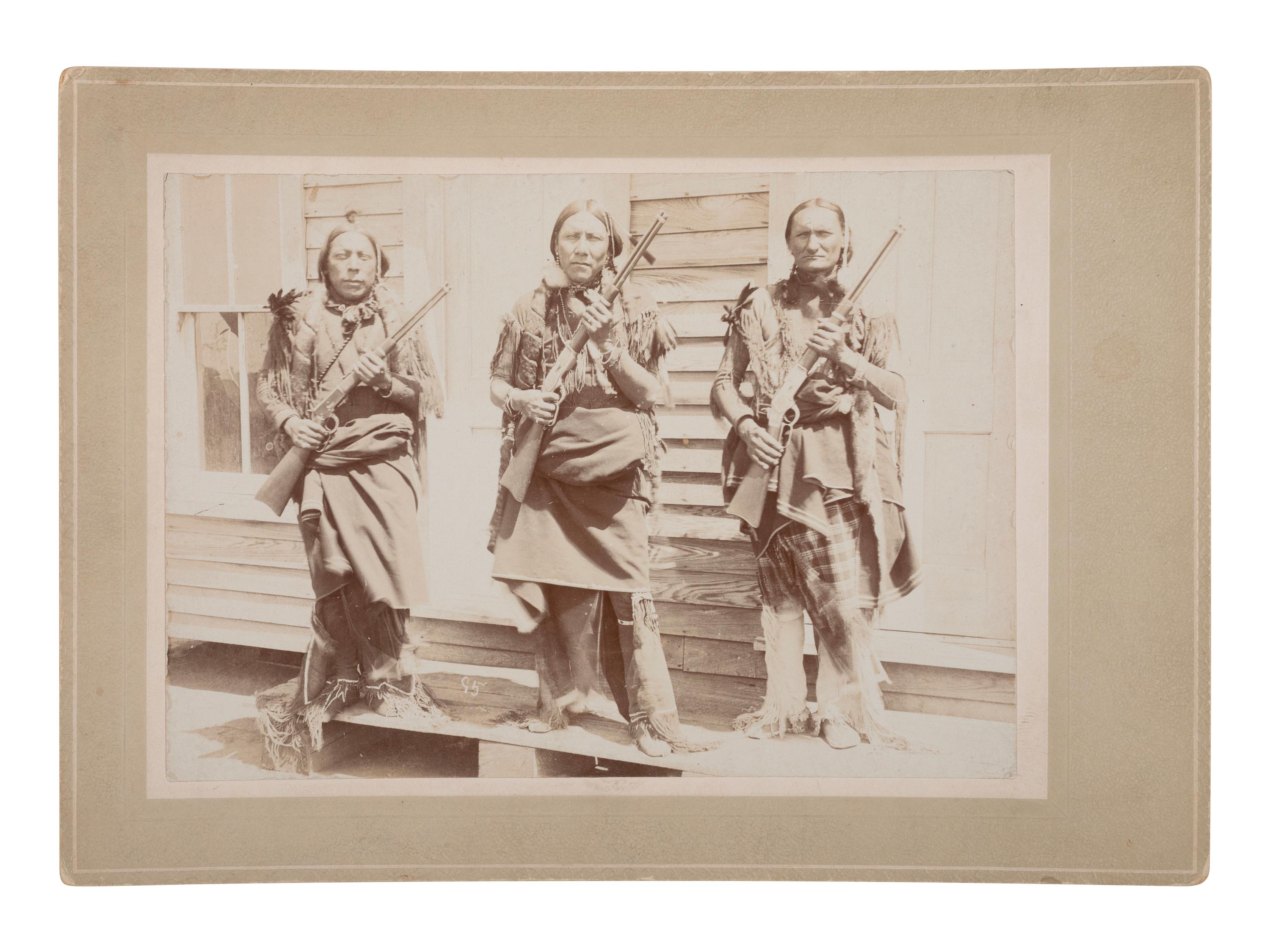 [NATIVE AMERICANS]. Cabinet card of Kiowa-Comanche Reservation leaders Silverhorn, Anko, and Comanche Jack. [Oklahoma, I.T.]: [Irwin], ca 1890s.