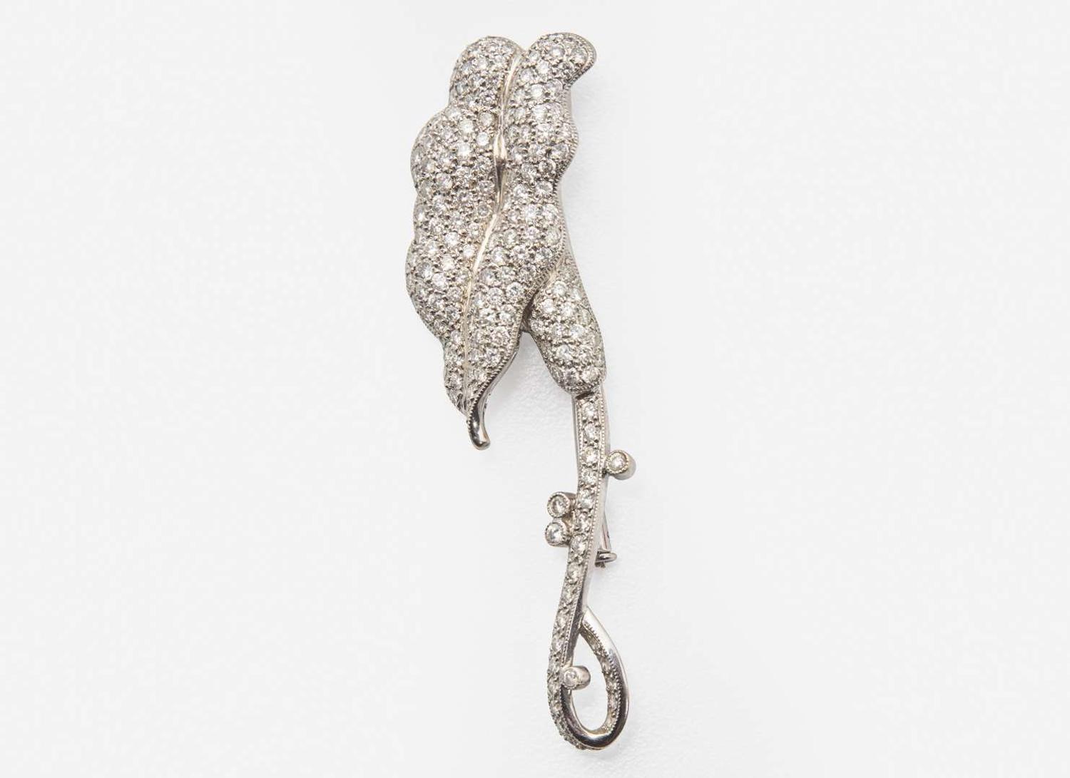 A Platinum and Diamond Flower Brooch