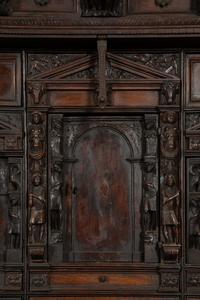 A Continental Baroque Walnut Cabinet