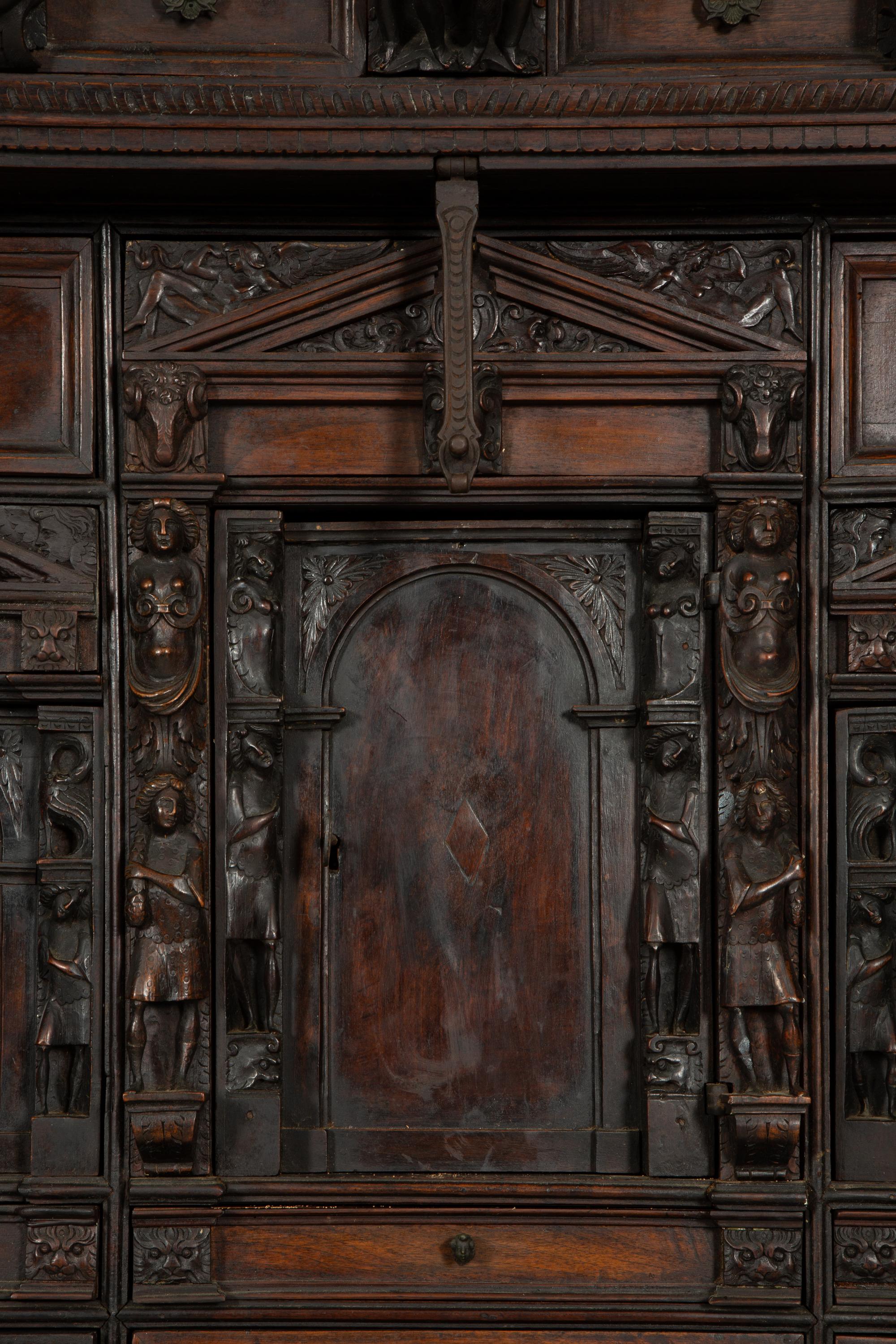A Continental Baroque Walnut Cabinet