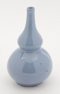 A Pale Blue Crackled Glaze Double-Gourd Form Vase. Height 7 1/4 inches.
