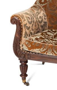 A Pair of William IV Carved Walnut Library Armchairs