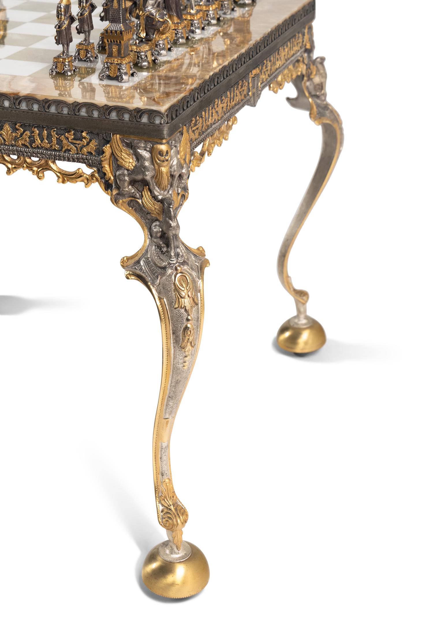 A Piero Benzoni Gilt Bronze, Silver-Plate and Onyx Chess Set