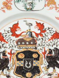 A Chinese Export Porcelain Parcel-Gilt Armorial Plate