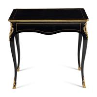 A Napoleon III Style Gilt Bronze Mounted Ebonized Table