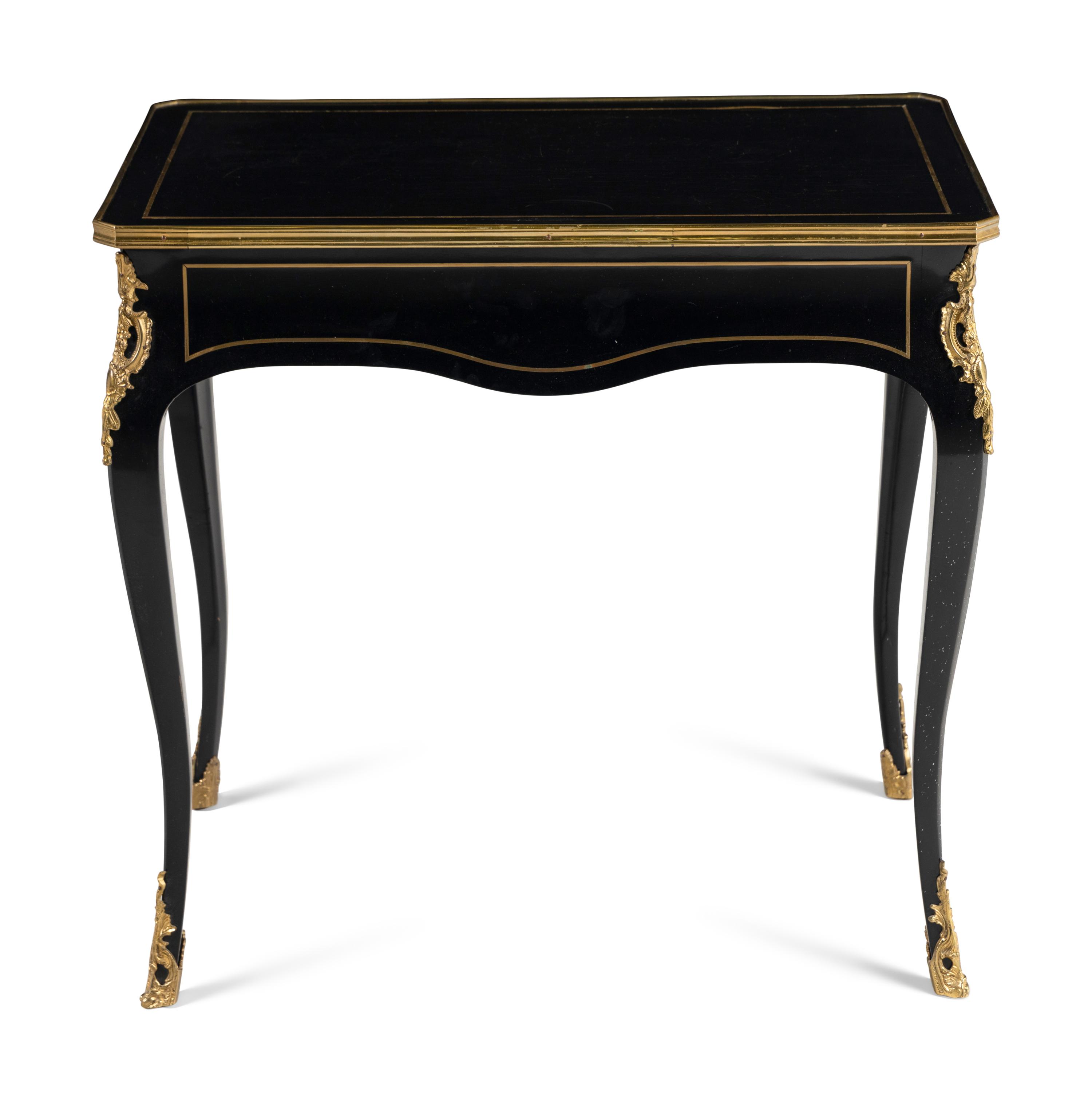 A Napoleon III Style Gilt Bronze Mounted Ebonized Table