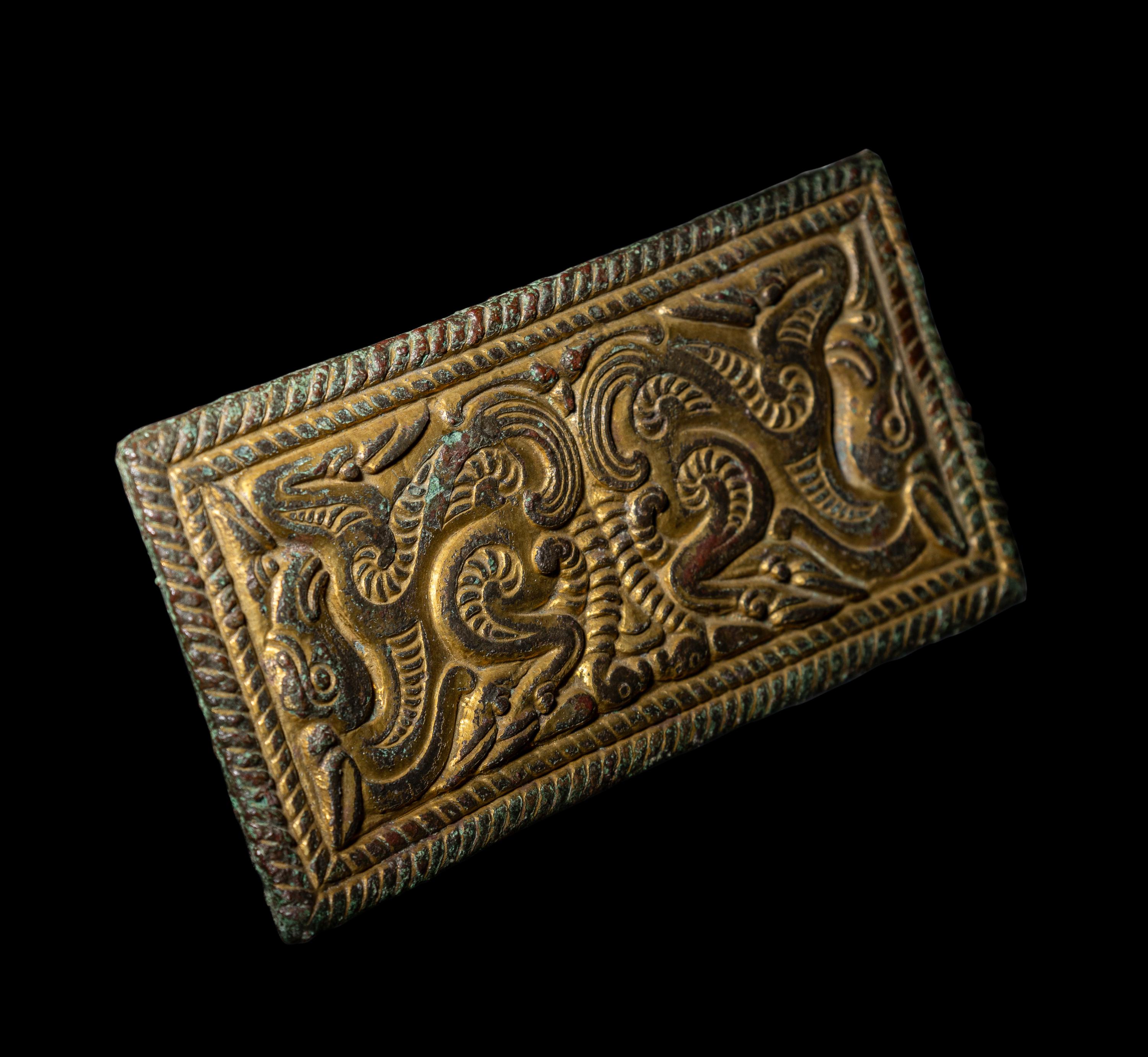 An Ordos Gilt-Bronze Plaque with Mythological Creatures